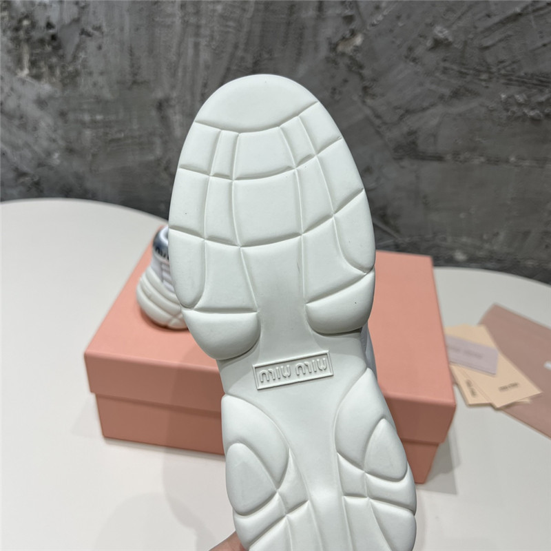 Miu Miu Quilted Leather Lace-up Sneakers