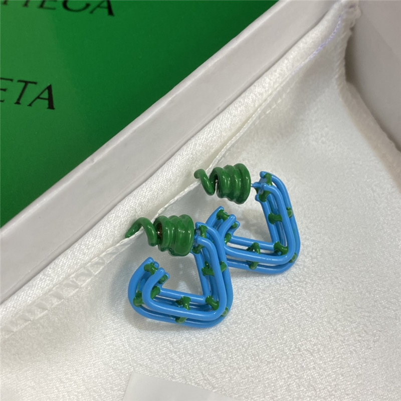 b0tt*ga Ven*ta blue oil spiral metal earrings