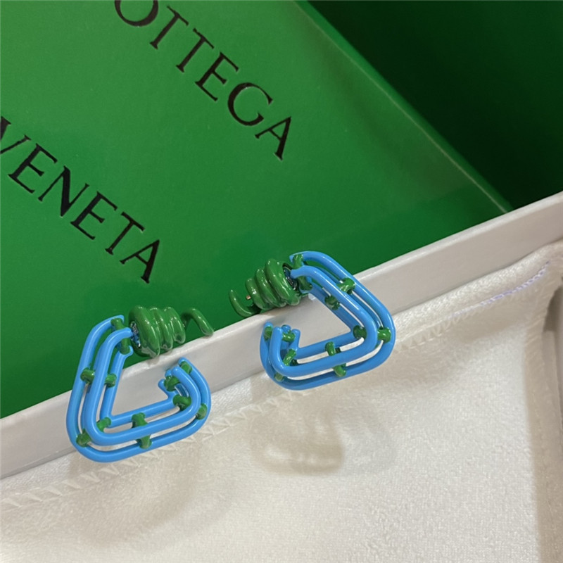 b0tt*ga Ven*ta blue oil spiral metal earrings