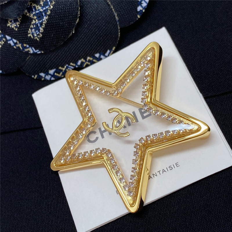 Ch**el transparent five-pointed star brooch