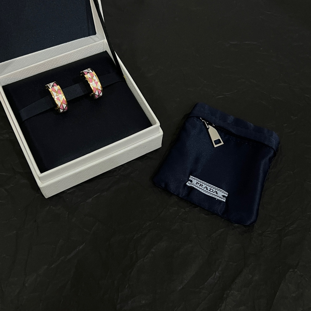 Pra*a triangle earrings