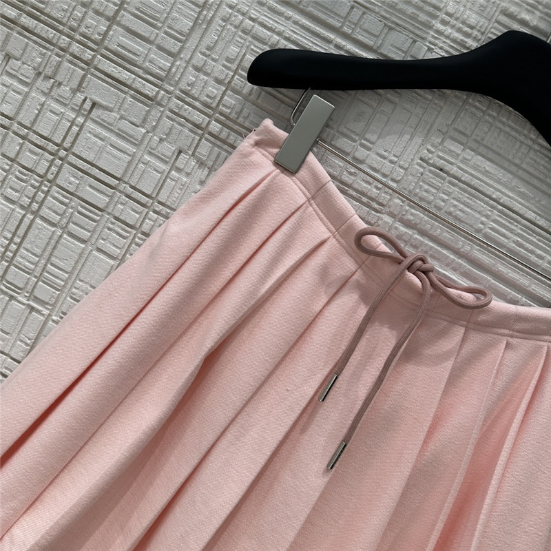 Pra*a fake two-piece top + pleated skirt replica d&g clothing