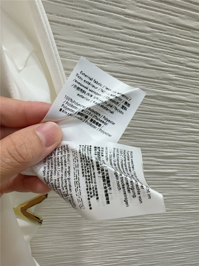 Va1e*ntin0 short-sleeved top + a-line long skirt replica clothing sites