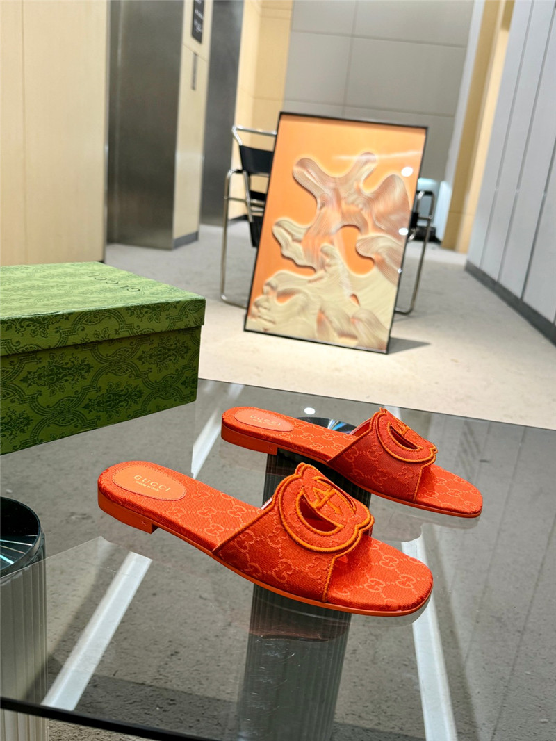 Gvc*1 interlocking g slide sandal in orange gg canvas