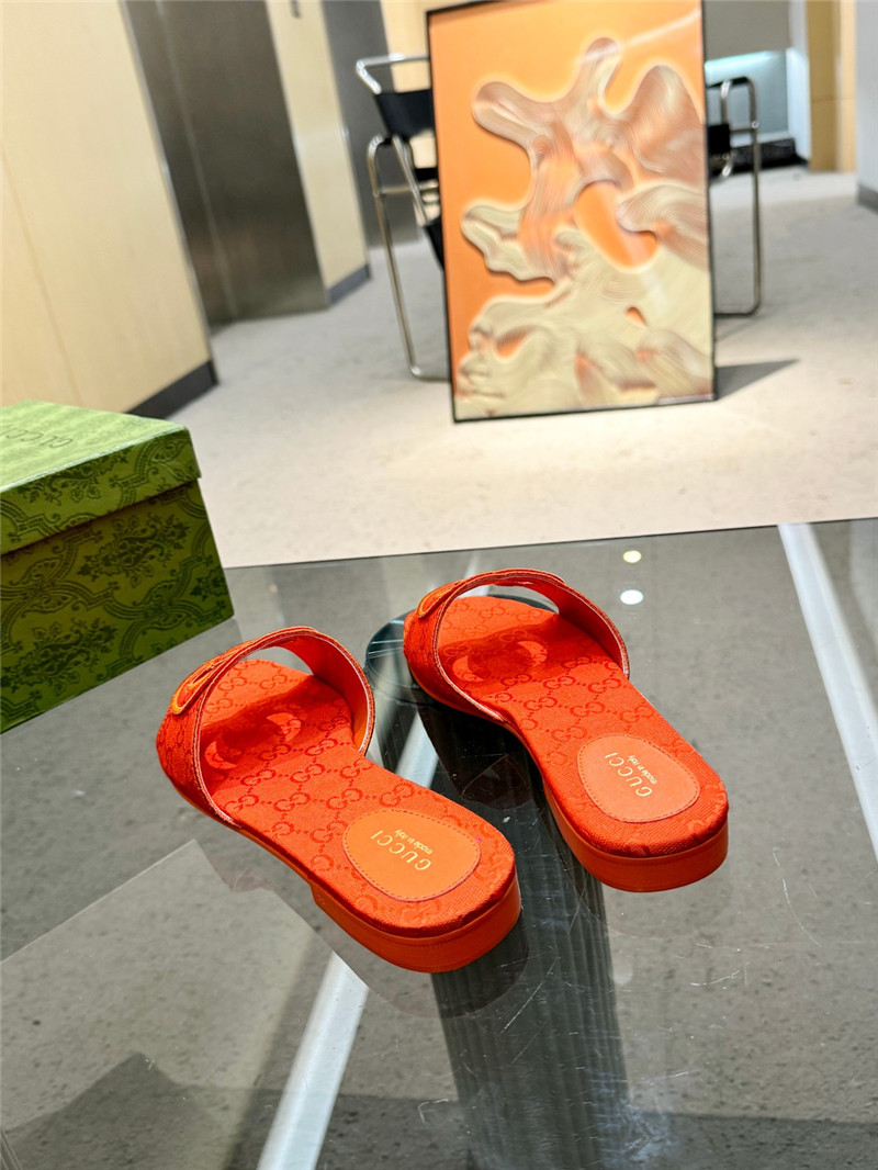 Gvc*1 interlocking g slide sandal in orange gg canvas