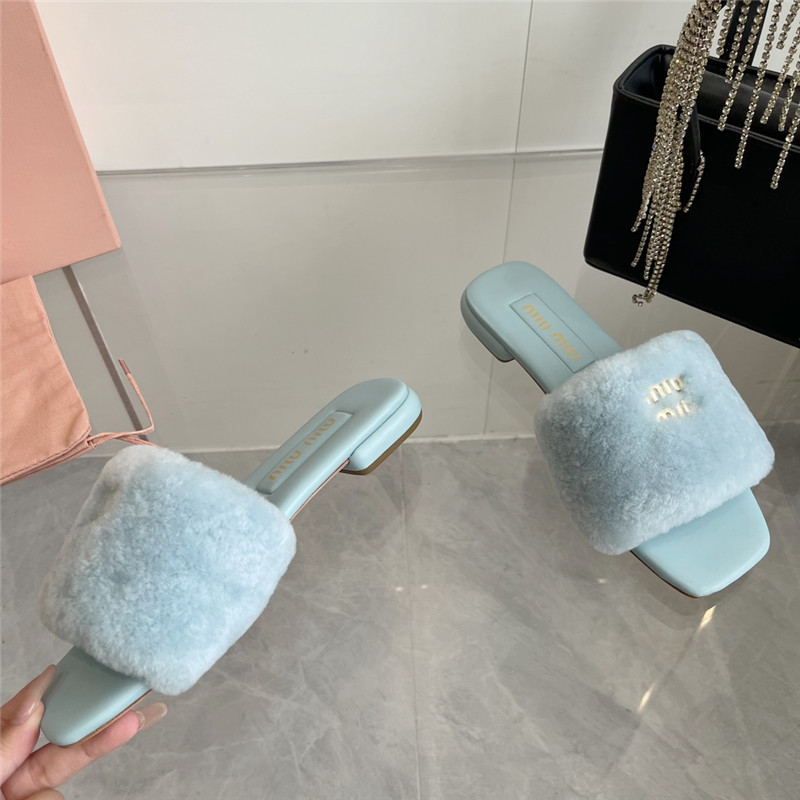 Miu Miu Blue Matelassé Fur Slides with Metal Lettering