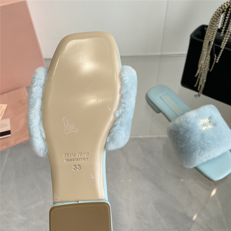 Miu Miu Blue Matelassé Fur Slides with Metal Lettering