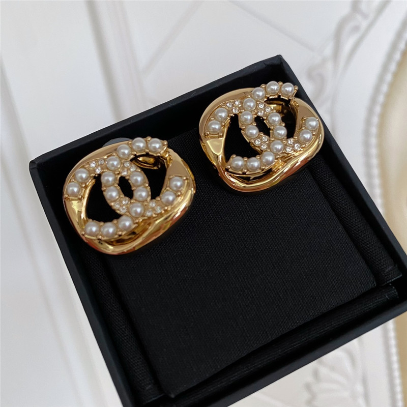 Ch**el hollow twisted sugar cube earrings