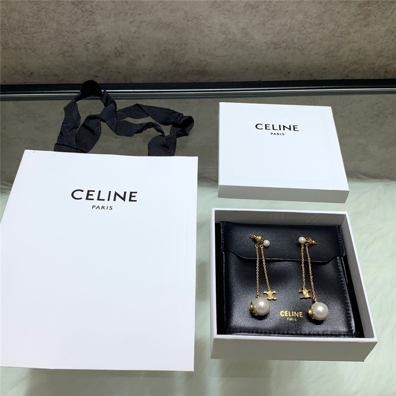 Ce1i*e double chain arc de triomphe hanging bead earrings