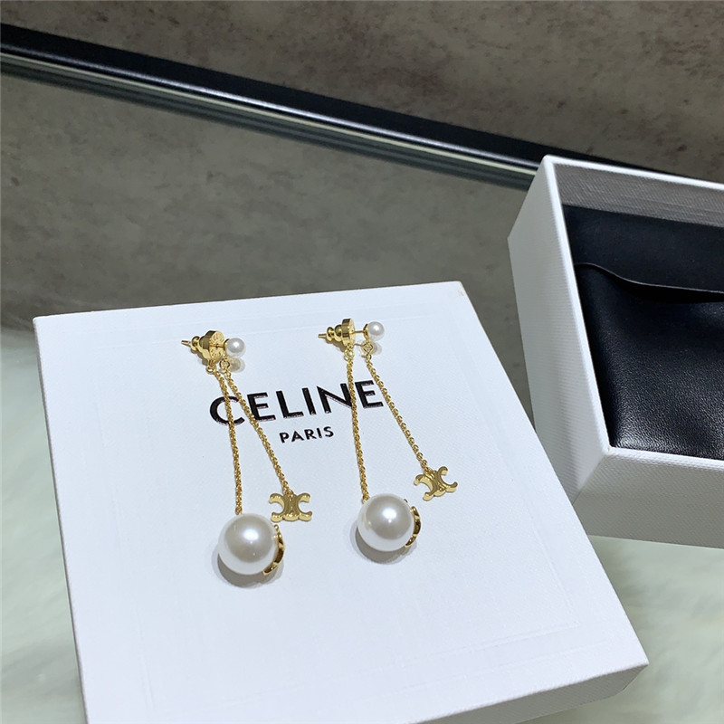 Ce1i*e double chain arc de triomphe hanging bead earrings