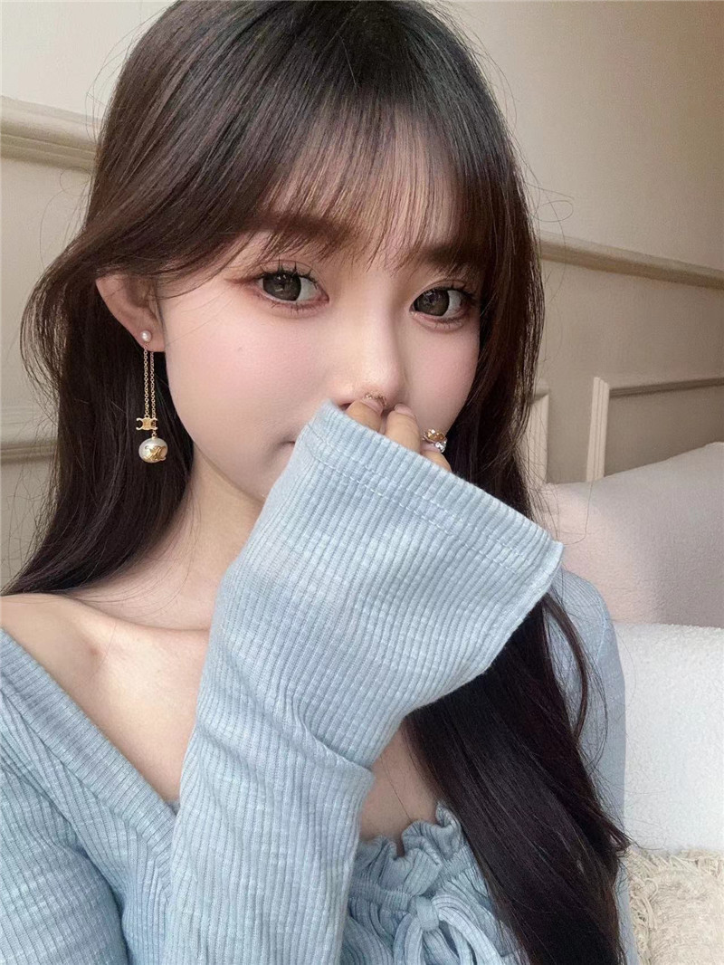 Ce1i*e double chain arc de triomphe hanging bead earrings