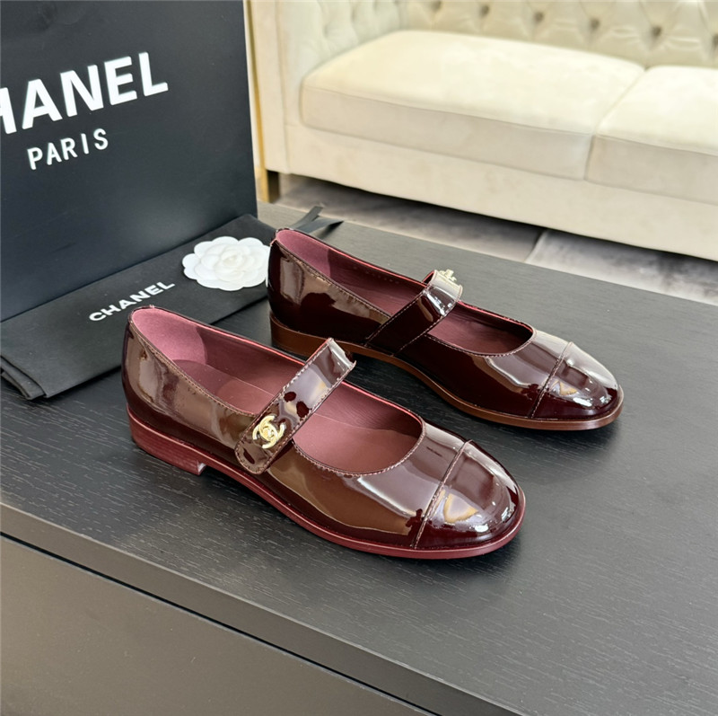 Ch**el gold interlock mary janes in burgundy patent calfskin