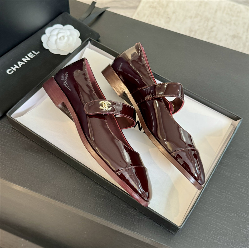 Ch**el gold interlock mary janes in burgundy patent calfskin