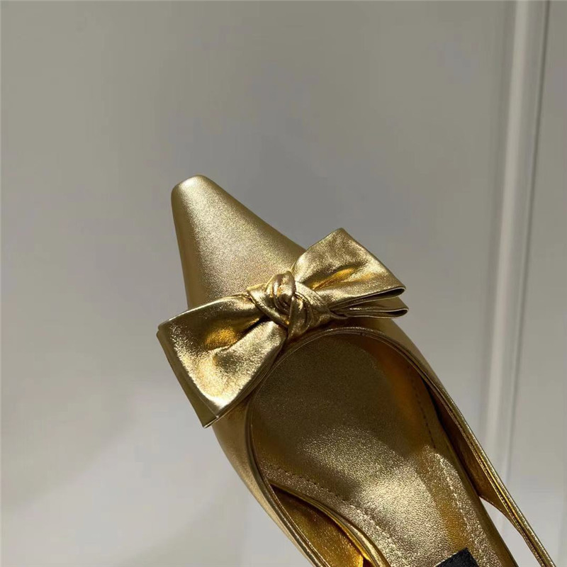 Dolce & Gabbana Gold Calfskin Slingbacks with Bow Detail