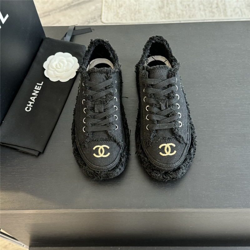 Ch**el lace-up canvas sneakers in black