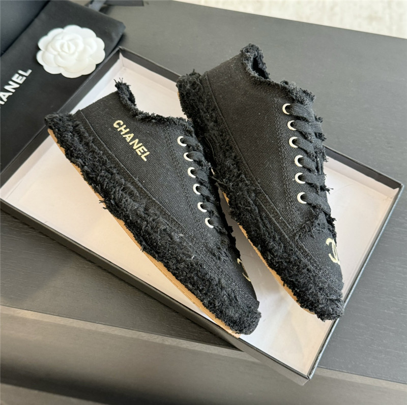 Ch**el lace-up canvas sneakers in black