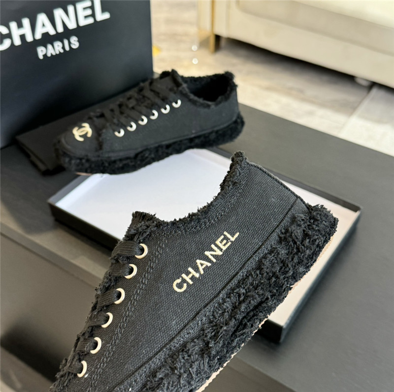 Ch**el lace-up canvas sneakers in black