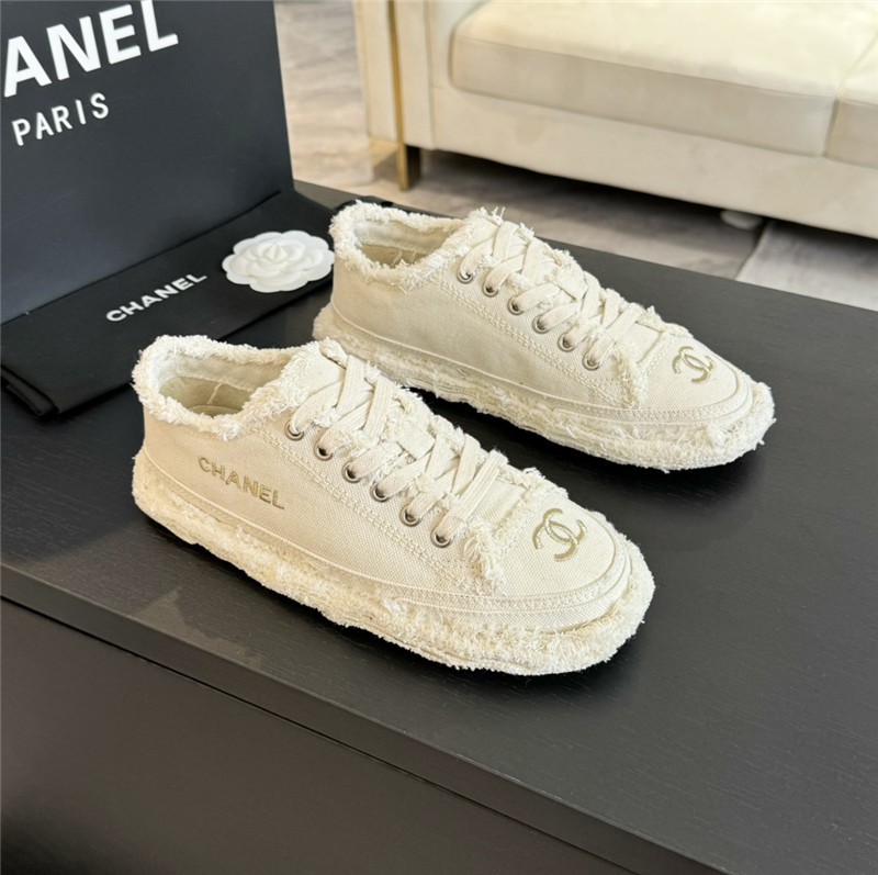 Ch**el lace-up canvas sneakers in white