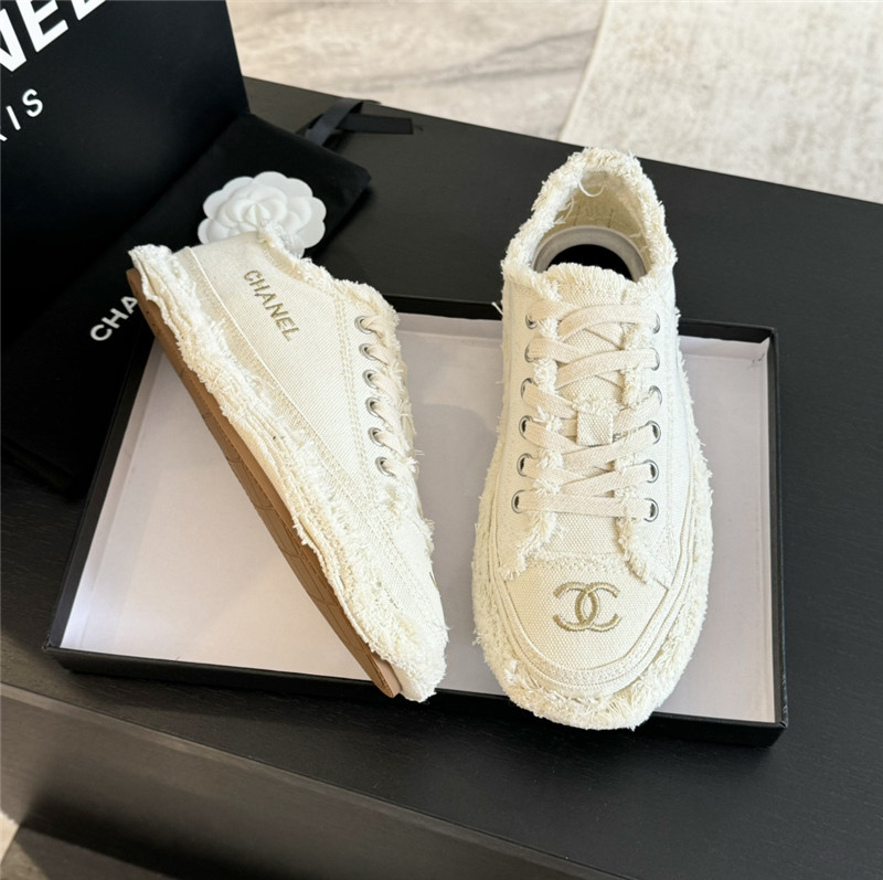 Ch**el lace-up canvas sneakers in white