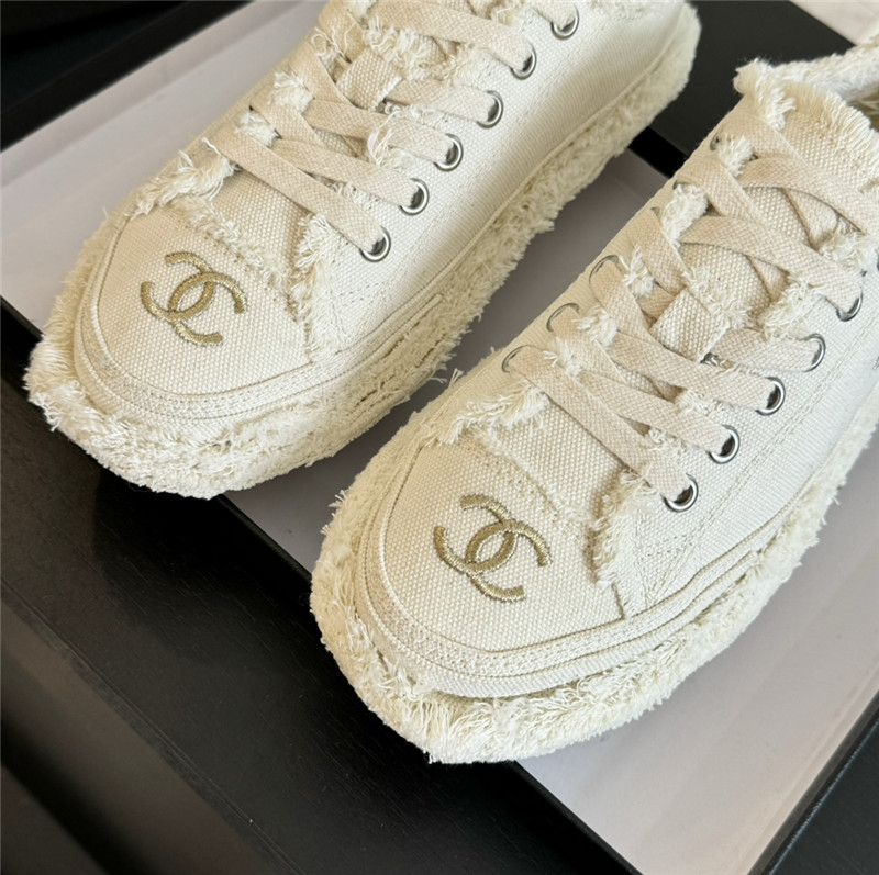 Ch**el lace-up canvas sneakers in white