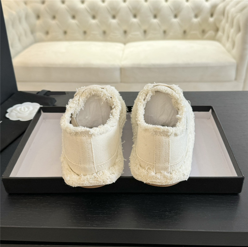 Ch**el lace-up canvas sneakers in white