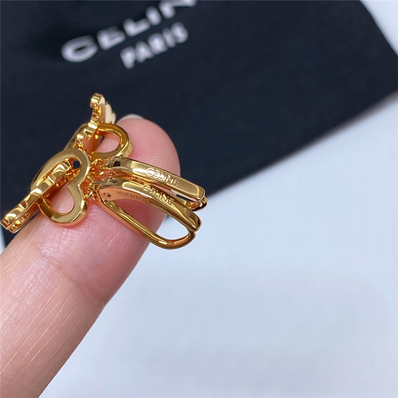 Ce1i*e arc de triomphe heart earrings