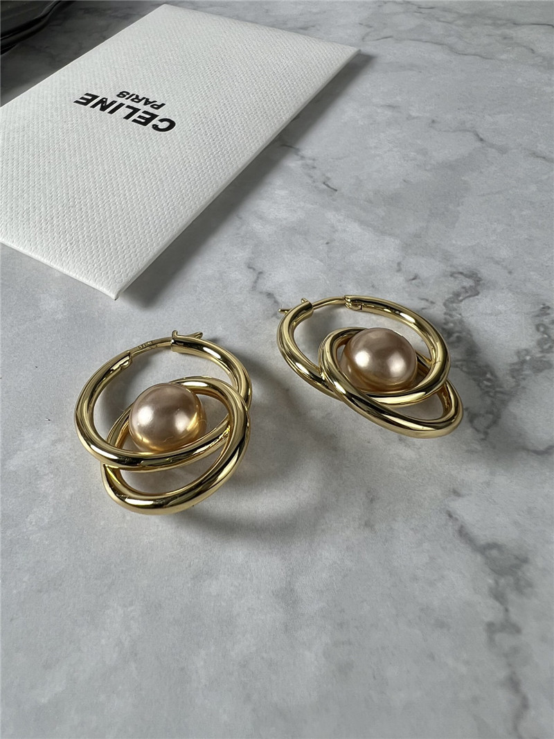 Ce1i*e double loop pearl earrings