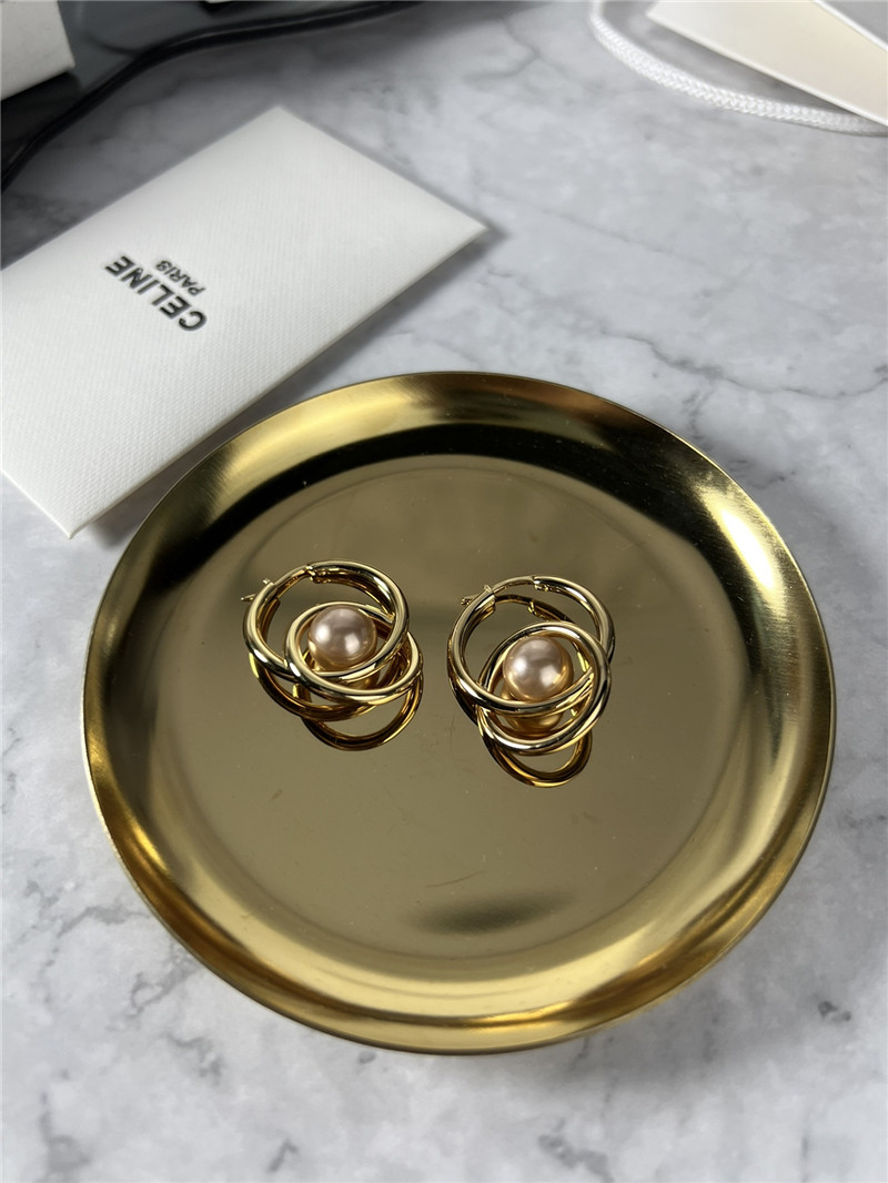 Ce1i*e double loop pearl earrings