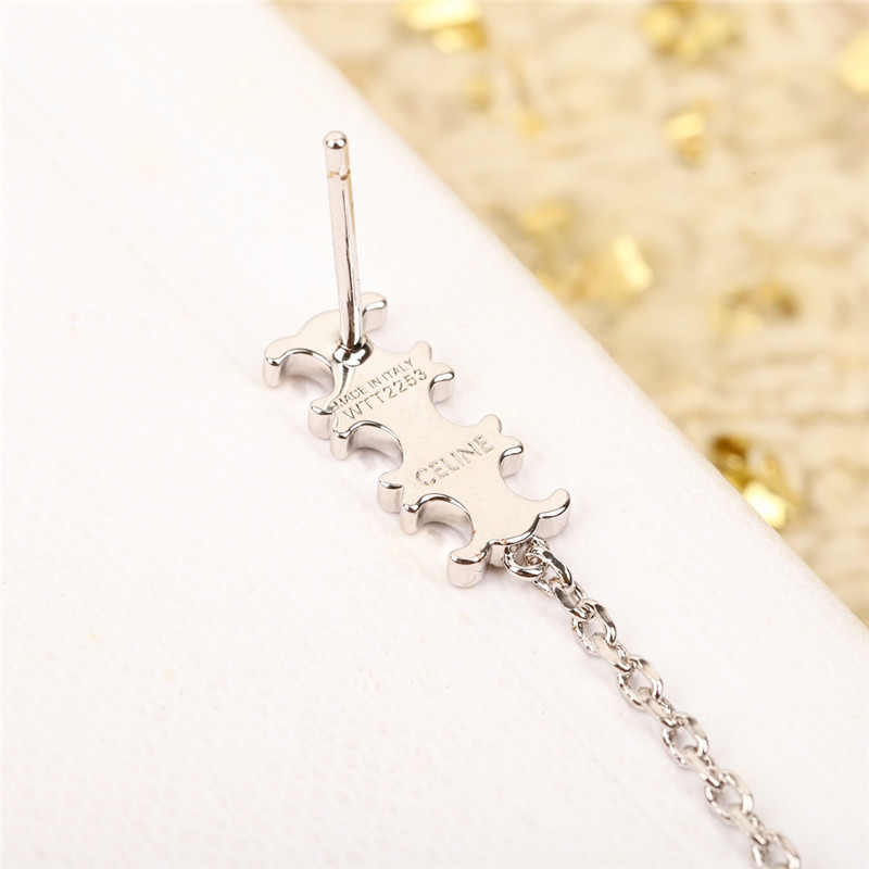 Ce1i*e three-dimensional arc de triomphe earrings