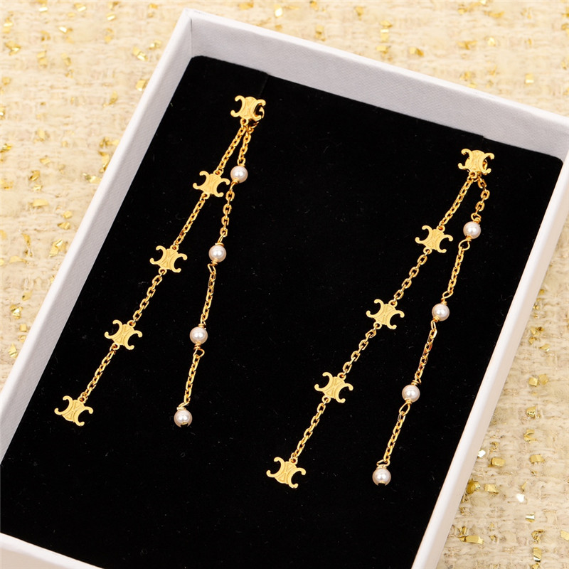 Ce1i*e three-dimensional arc de triomphe pearl earrings