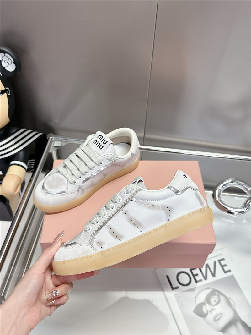 Miu Miu Bleached Leather Sneakers