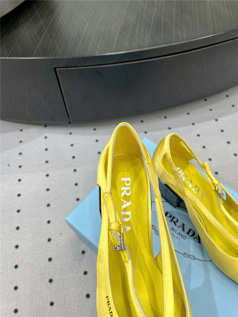 Pra*a yellow satin cut-out pumps in silk viscose