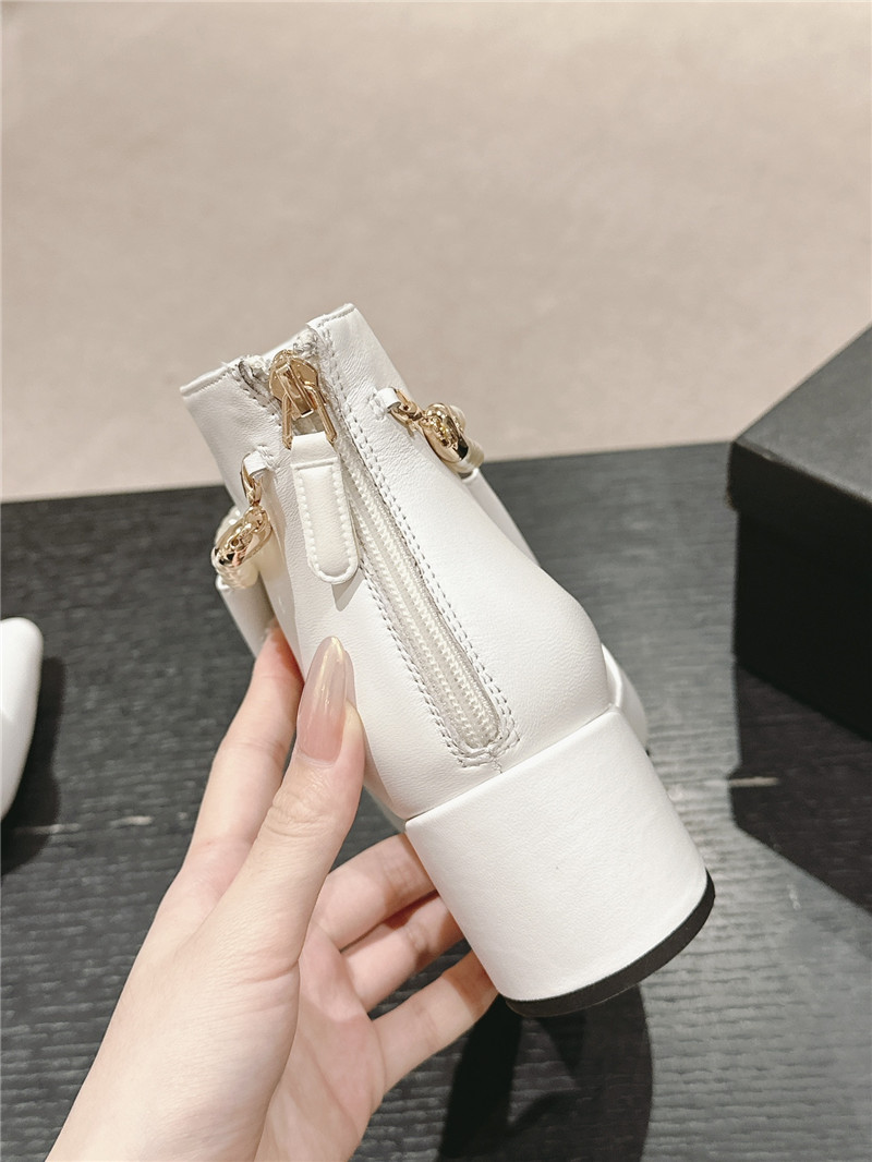 Ch**el white pointed toe bow pearl ankle boots