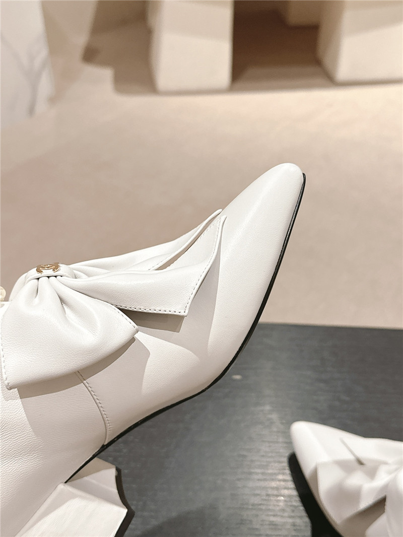 Ch**el white pointed toe bow pearl keen high boots