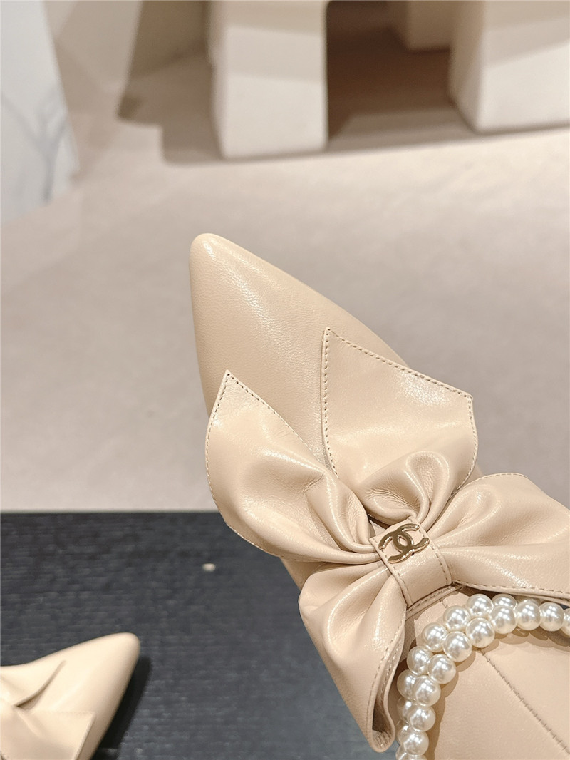 Ch**el beige pointed toe bow pearl keen high boots