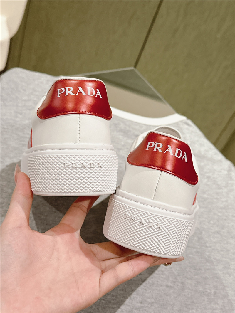 Pra*a white laced low-top sneakers