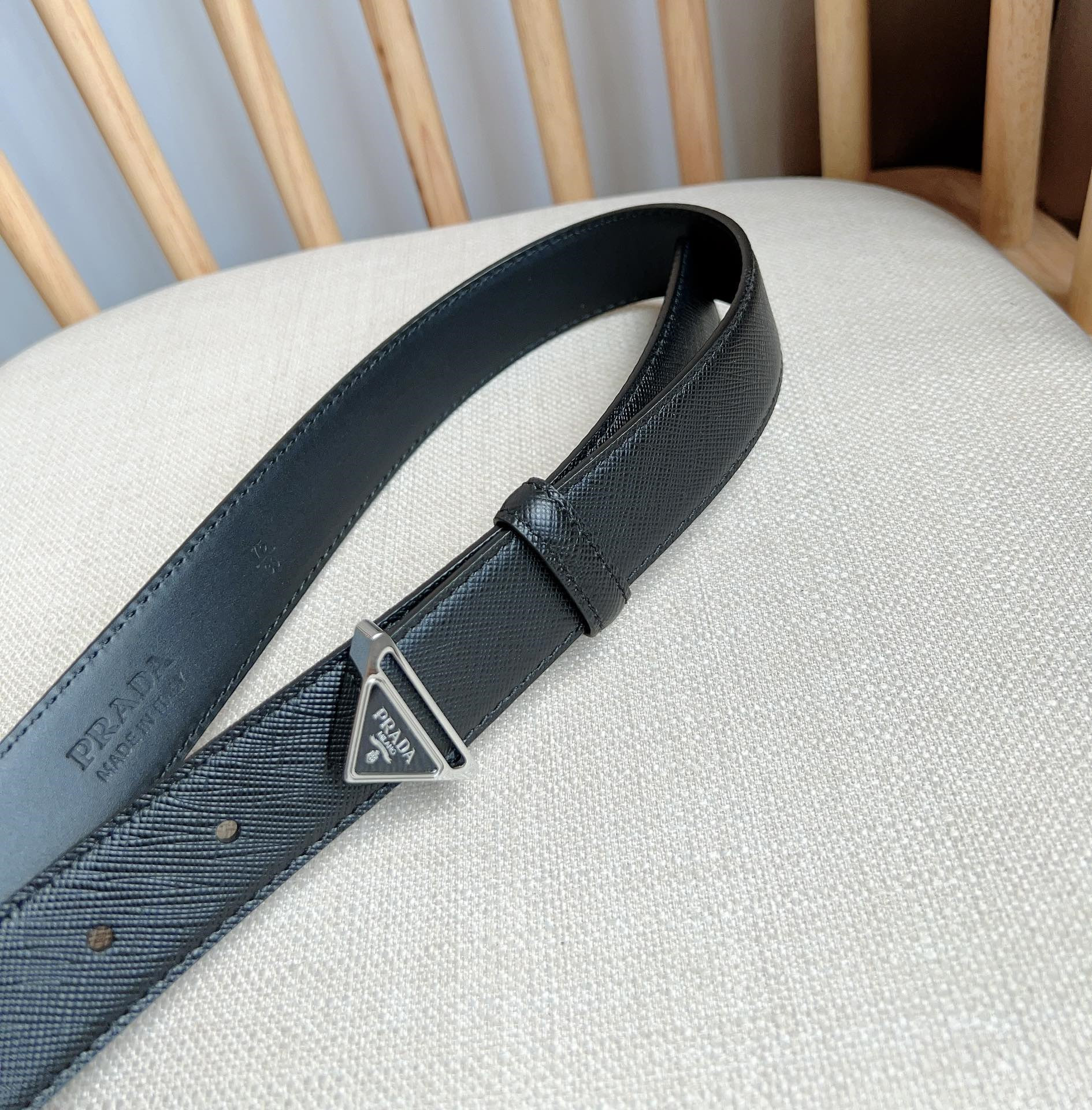 Pra*a triangle logo outline belt