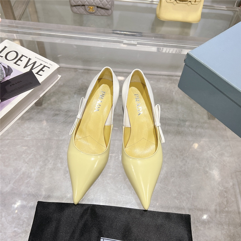 Pra*a chunky pointed pumps in yellow and white calfskin