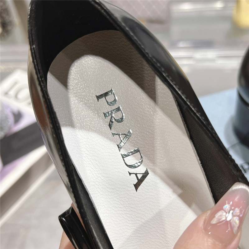 Pra*a chunky pointed pumps in black and white calfskin