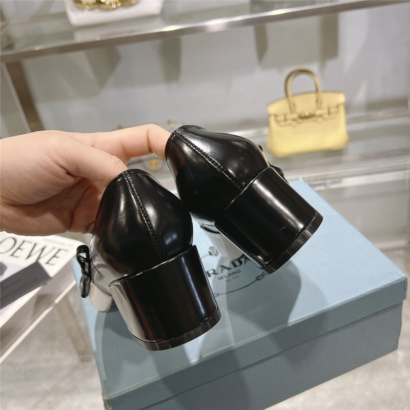 Pra*a chunky pointed pumps in black and white calfskin