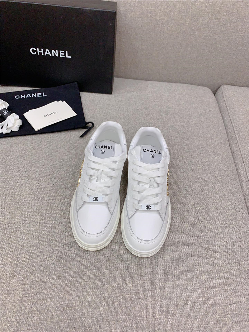 Ch**el white lace-up trainers