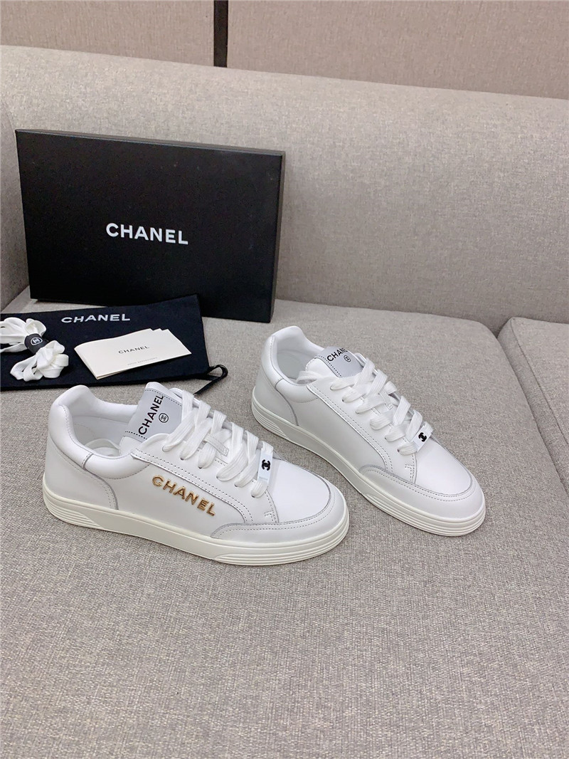 Ch**el white lace-up trainers