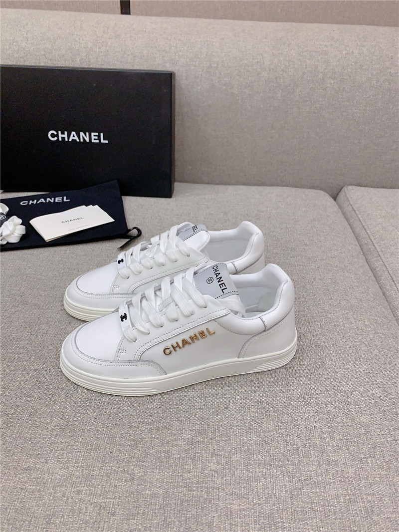 Ch**el white lace-up trainers