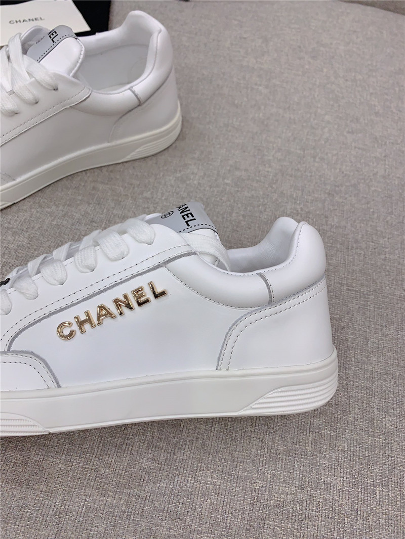 Ch**el white lace-up trainers
