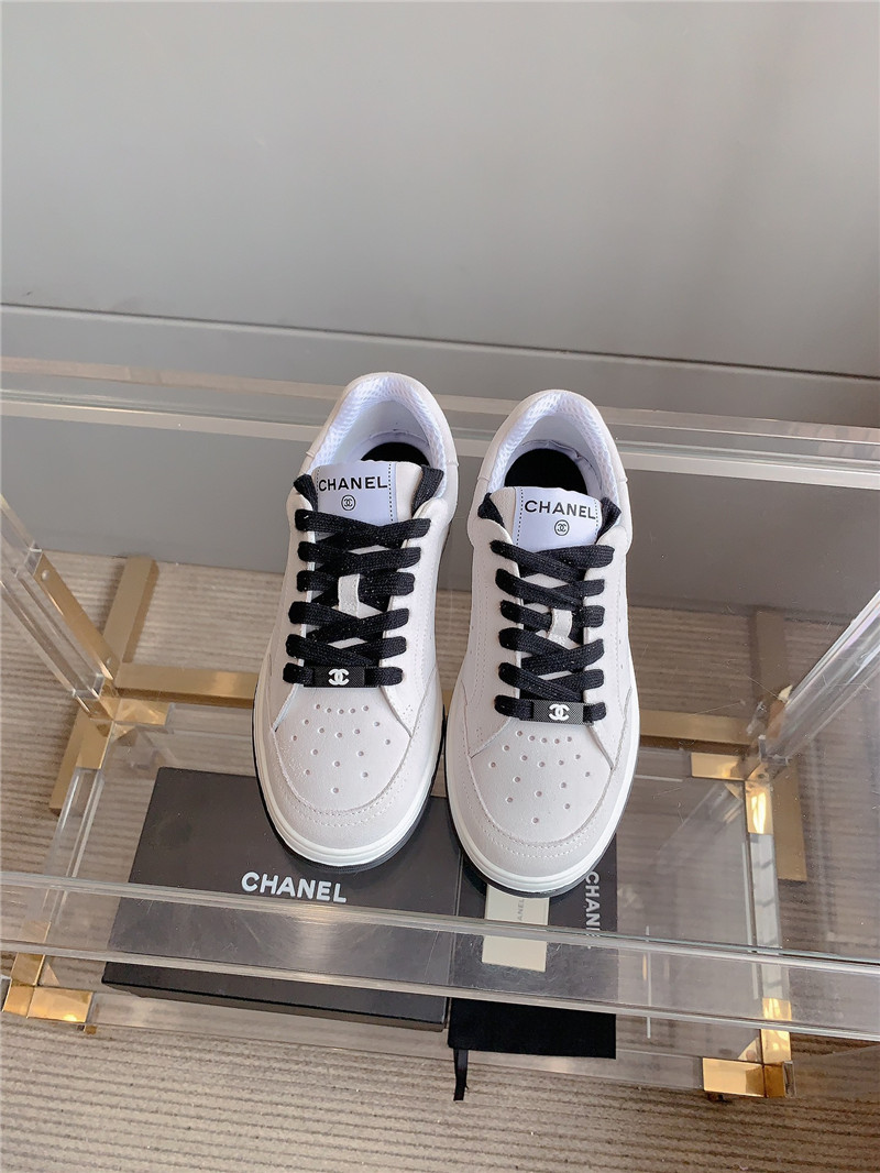 Ch**el calfskin lace-up low top sneakers