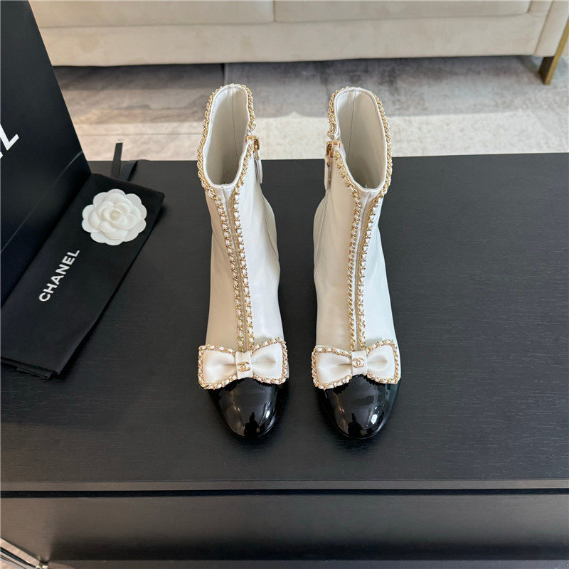 Ch**el white calfskin bow patent leather ankle boots