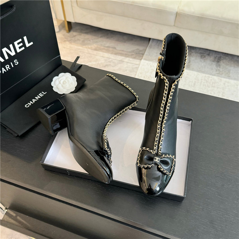 Ch**el black calfskin bow patent leather ankle boots