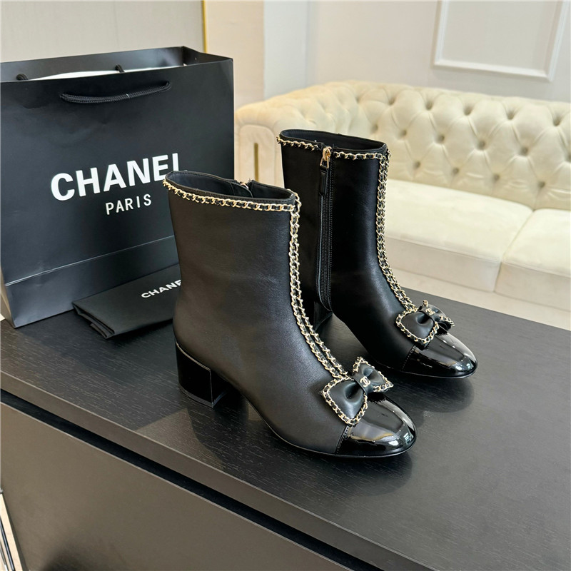 Ch**el black calfskin bow patent leather ankle boots