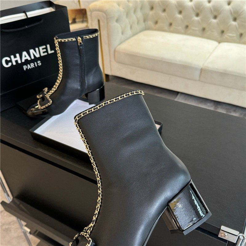 Ch**el black calfskin bow patent leather ankle boots