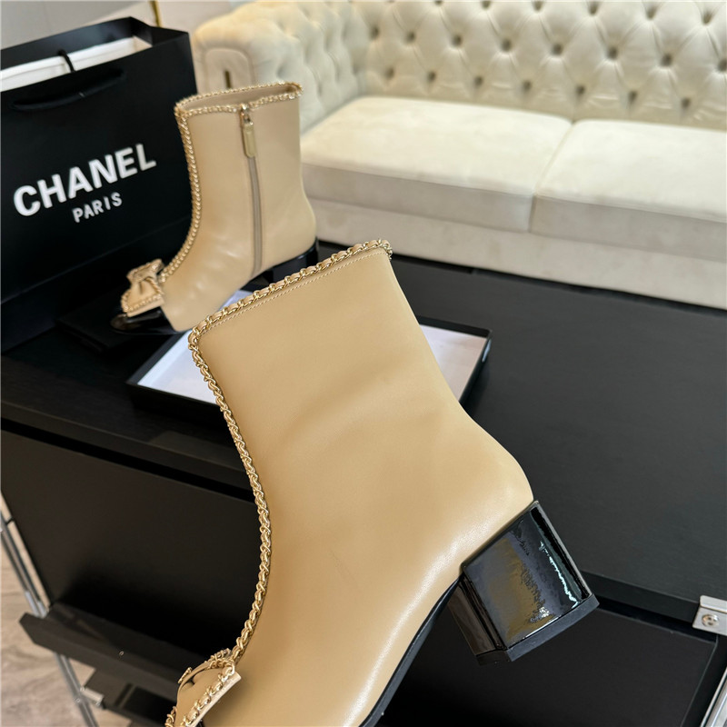 Ch**el calfskin bow patent leather ankle boots
